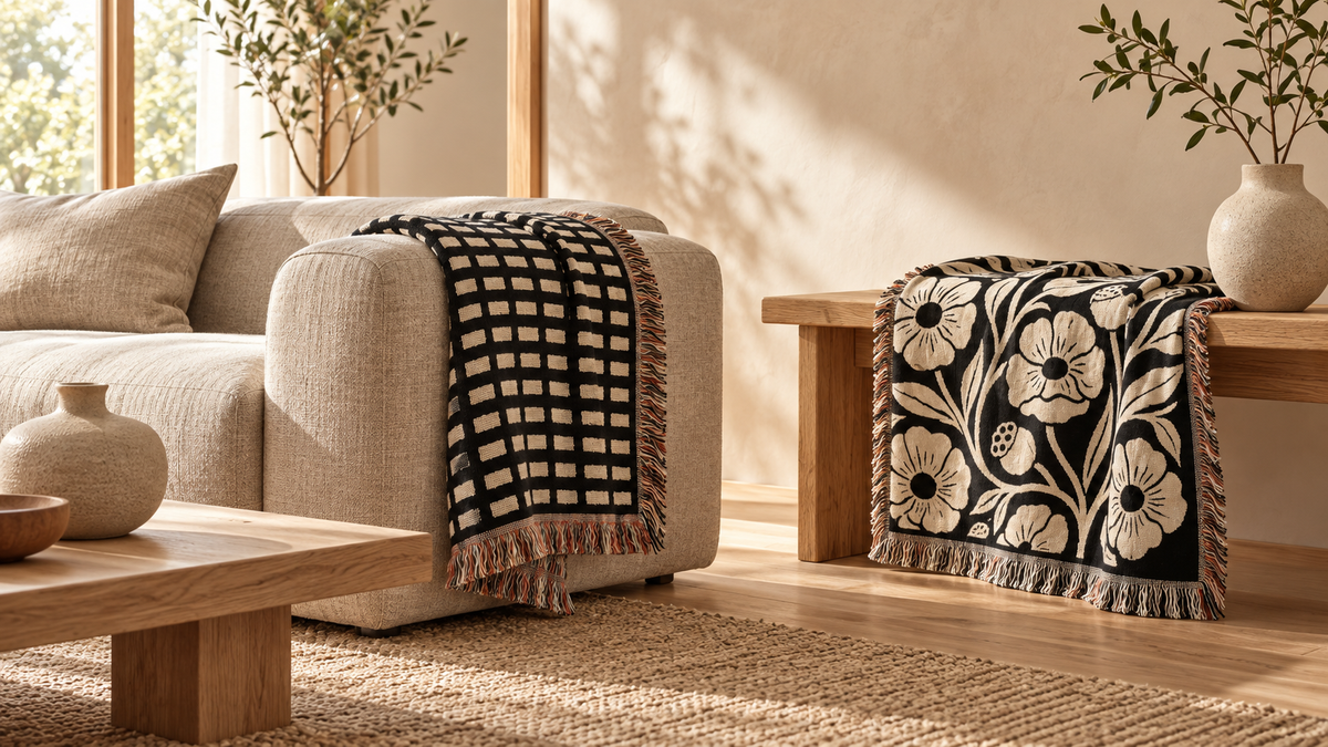 Black and cream grid and poppy woven throws in a Japandi living room