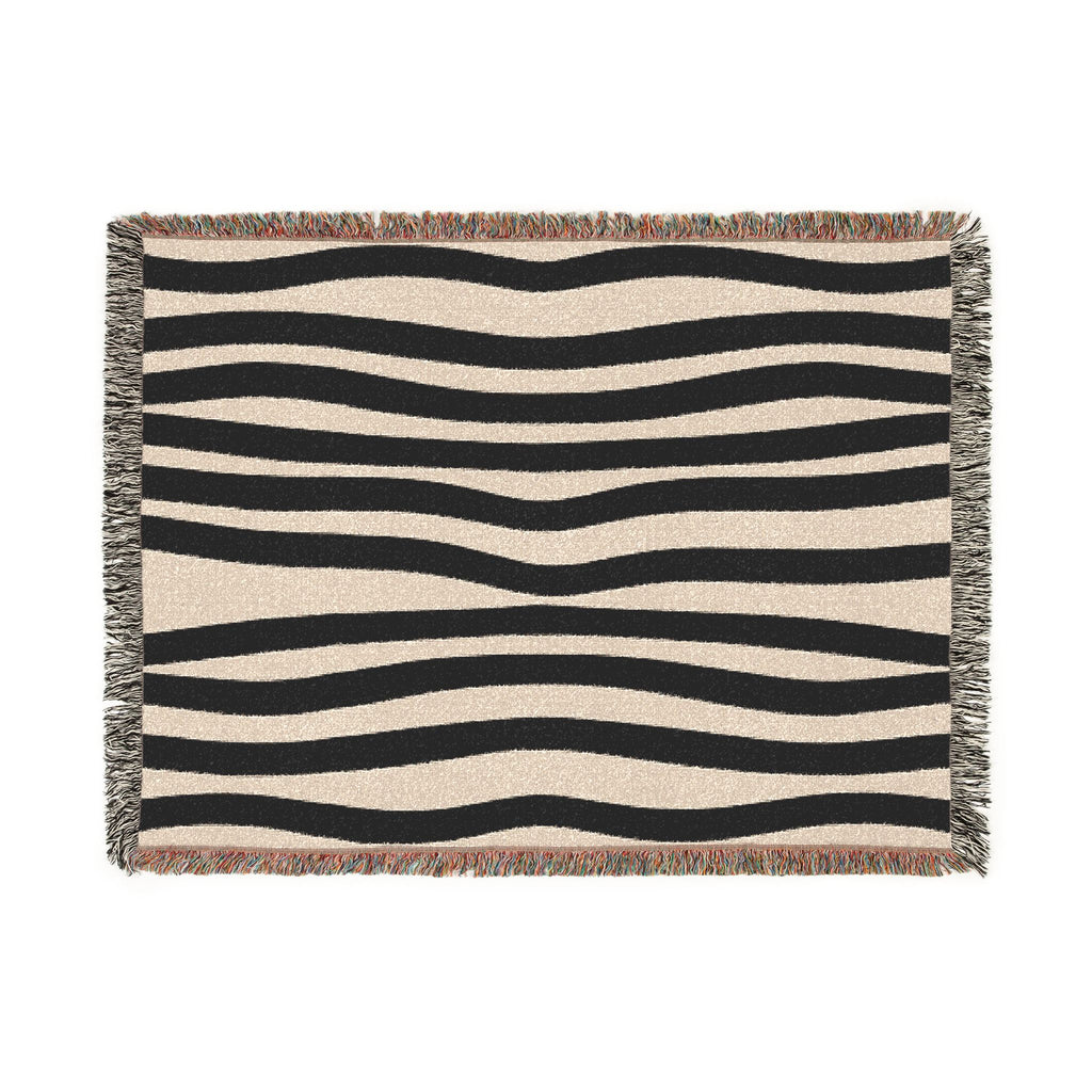 Modern zebra-inspired cotton throw with woven fringe