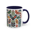 Colorful Scandinavian folk bird accent mug with navy rim and handle
