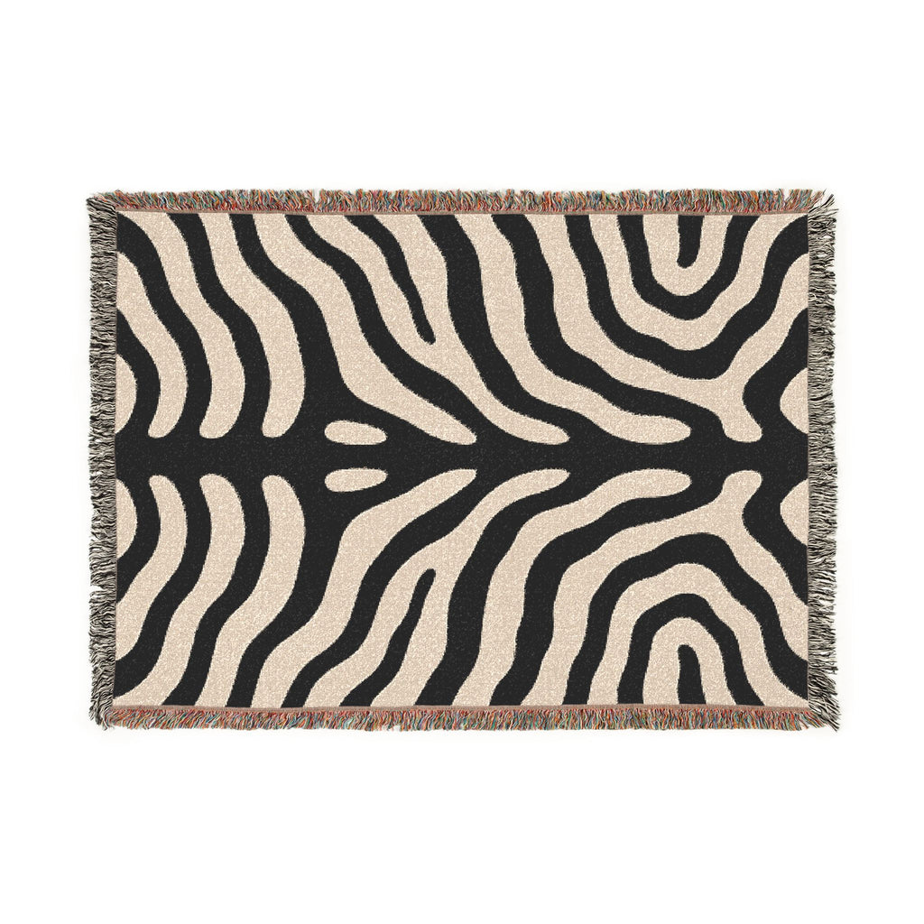 Black and cream zebra print woven throw blanket in a horizontal size