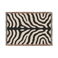 Black and cream zebra print woven throw blanket in a horizontal size