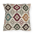 Southwestern geometric outdoor pillow in rust, olive, blue and cream
