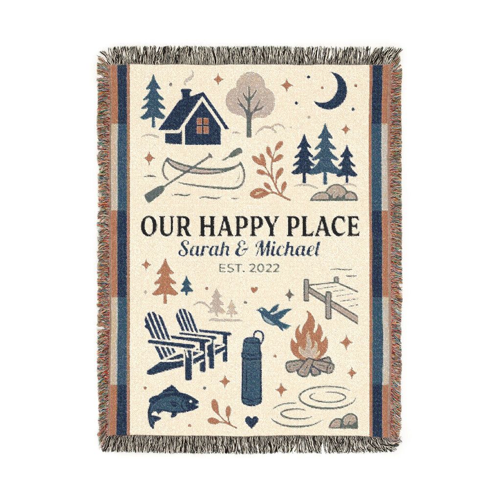 Personalized Our Happy Place woven blanket with cabin, canoe and campfire artwork