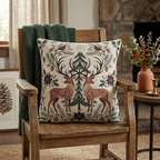 Christmas deer and cardinal woven pillow on a rustic wooden chair