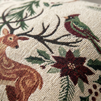 Close-up of woven deer, cardinal, evergreen and winter floral details