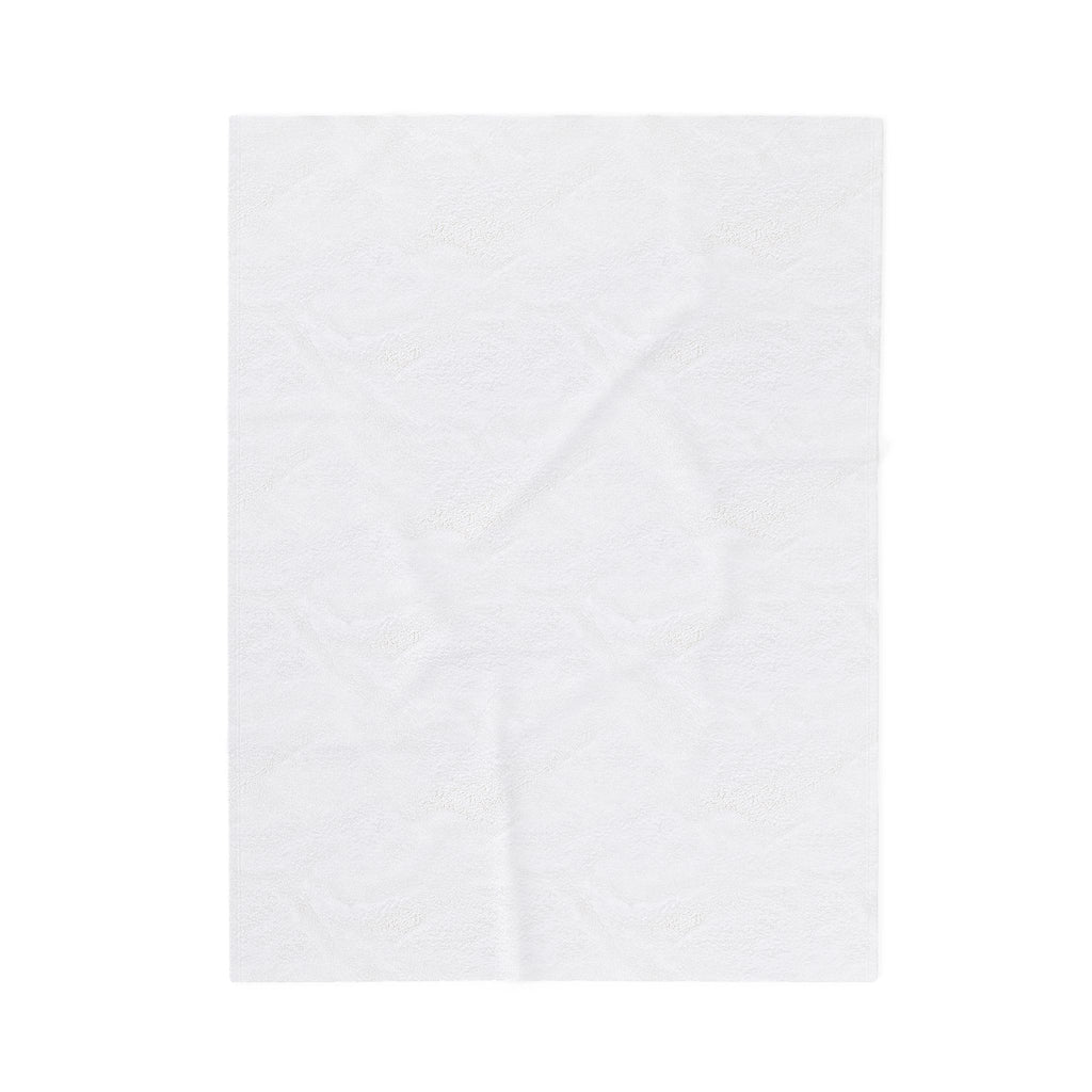 Close view of the soft white reverse side of the plush blanket