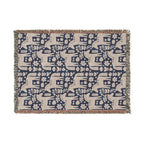 Blue and cream repeating Dala horse woven blanket with Swedish folk pattern and fringe