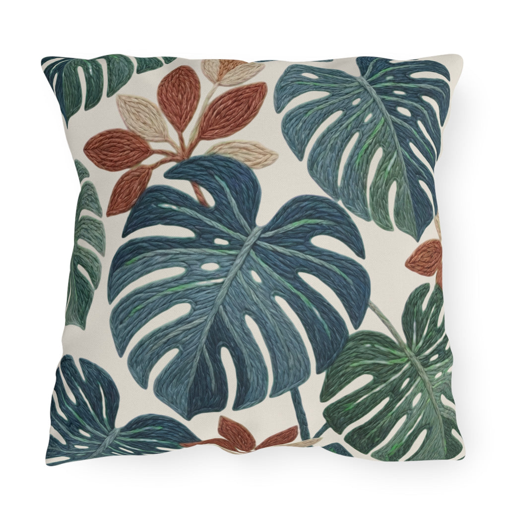 Tropical monstera outdoor pillow in deep green, teal, rust and cream