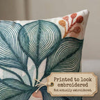 Blue green abstract leaf pillow printed to look embroidered, not actually embroidered