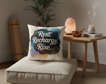 Rest Recharge Rise motivational pillow