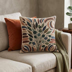 Mid-century botanical woven pillow in terracotta, olive, blue and cream