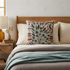 Botanical floral woven pillow styled as an earth-tone sofa accent