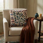 Double-sided botanical woven pillow in warm earth tones