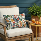 Scandinavian folk bird outdoor pillow with floral pattern — view 1