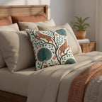 Tiger and peacock decorative pillow styled on a modern neutral bed