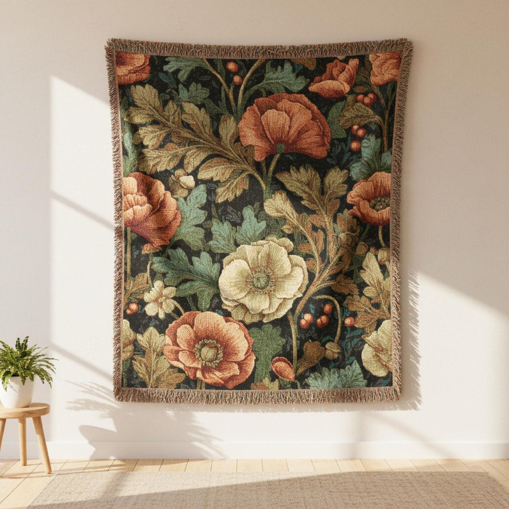 William Morris-inspired coral poppy and teal botanical woven blanket displayed as textile art